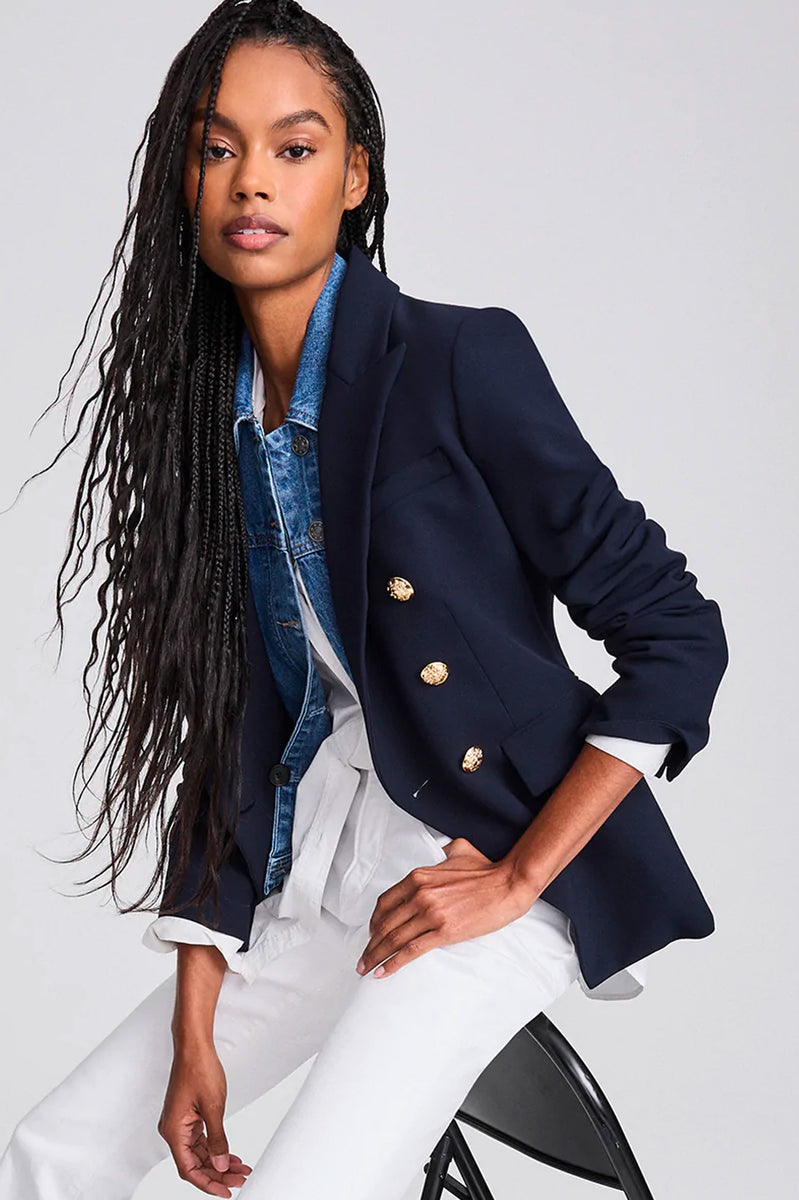 Navy blue jacket store with gold buttons