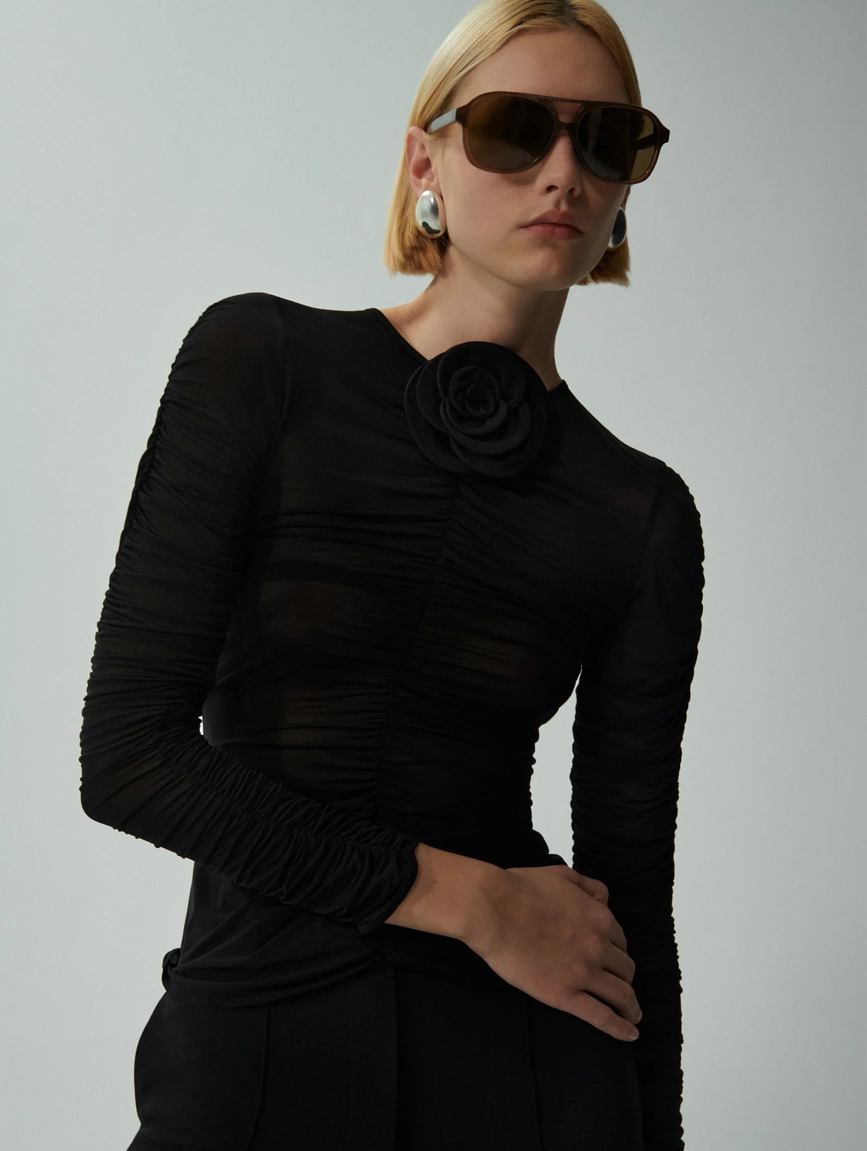 Sheer Ruched Rose Appliqué Top in Black