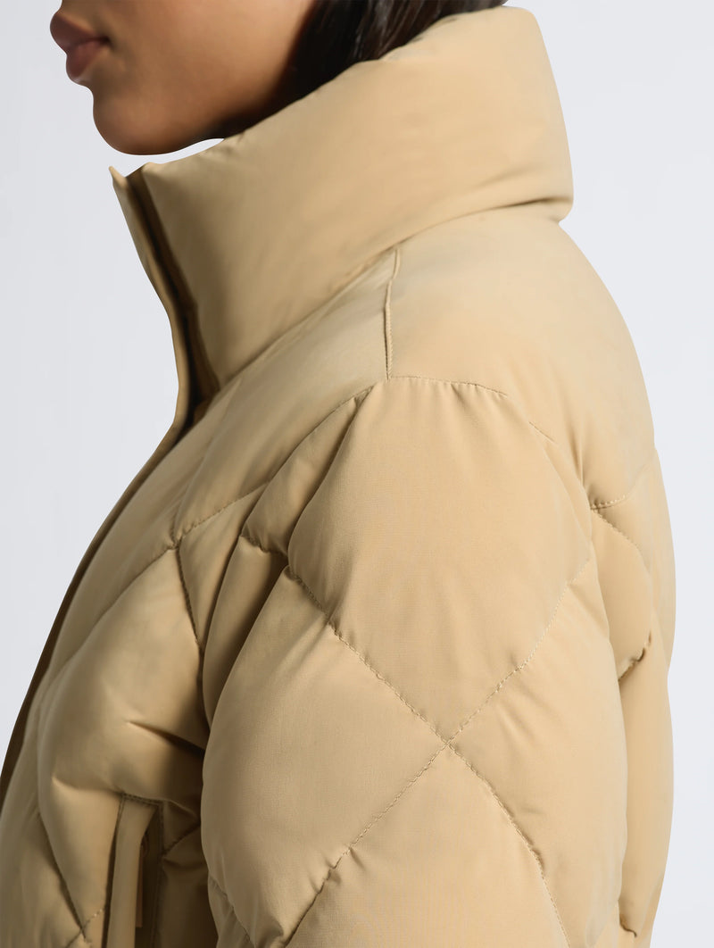 Saskia Ski Suit in Tan and Black