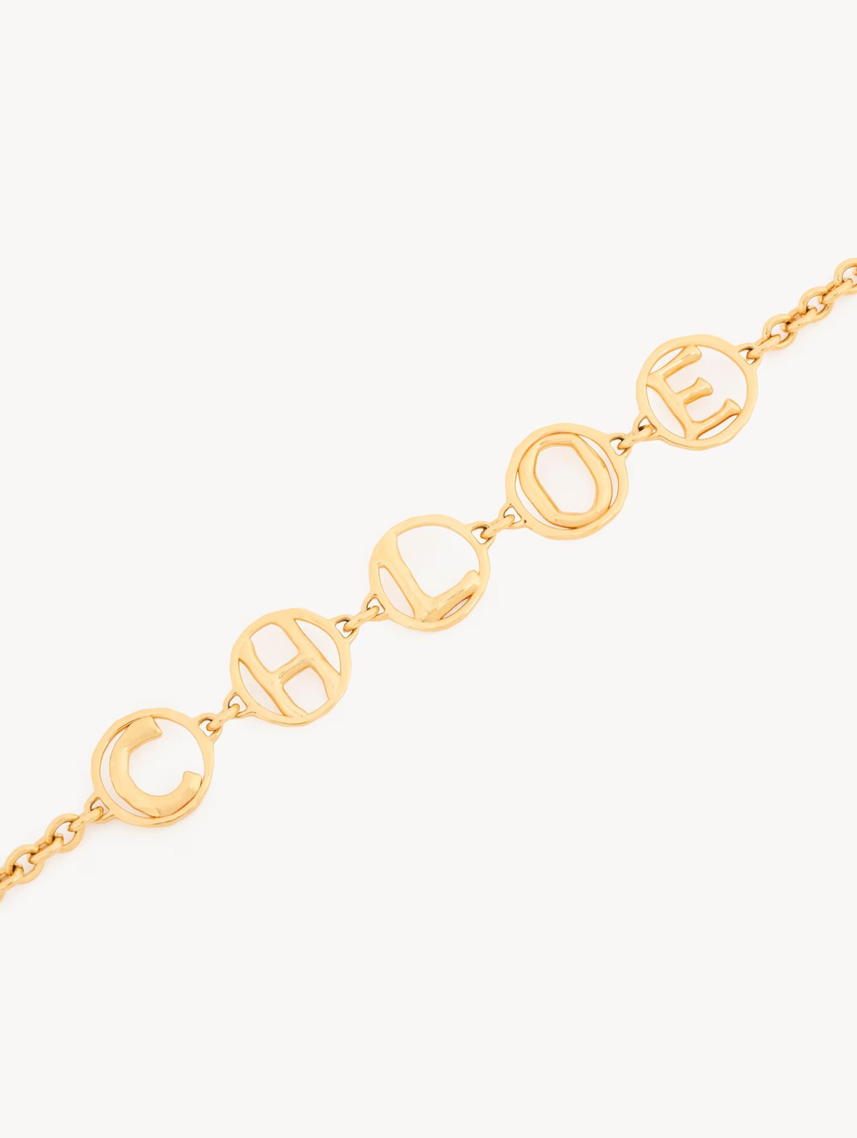 The Chloé Script Choker in Vintage Gold