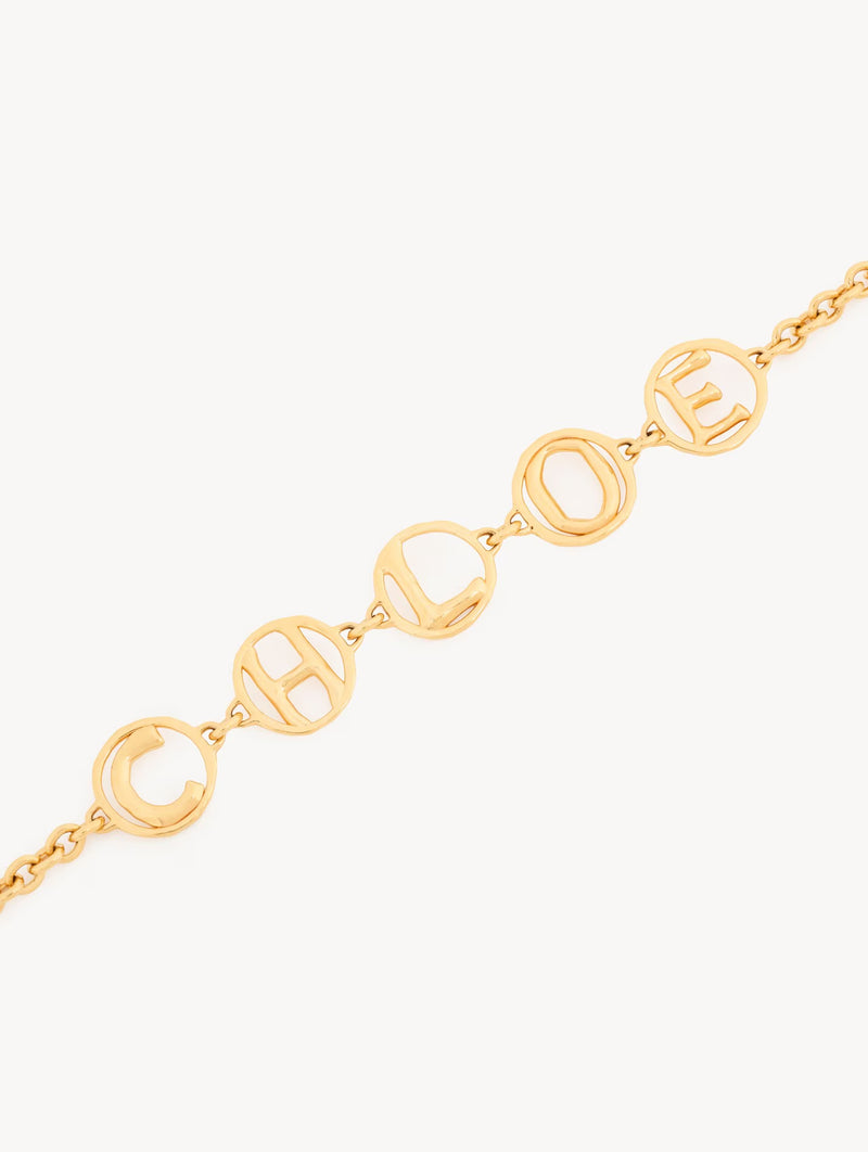 The Chloé Script Choker in Vintage Gold