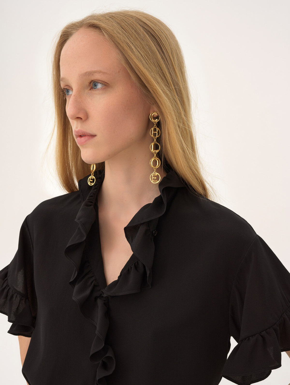 The Chloé Script Earrings in Vintage Gold