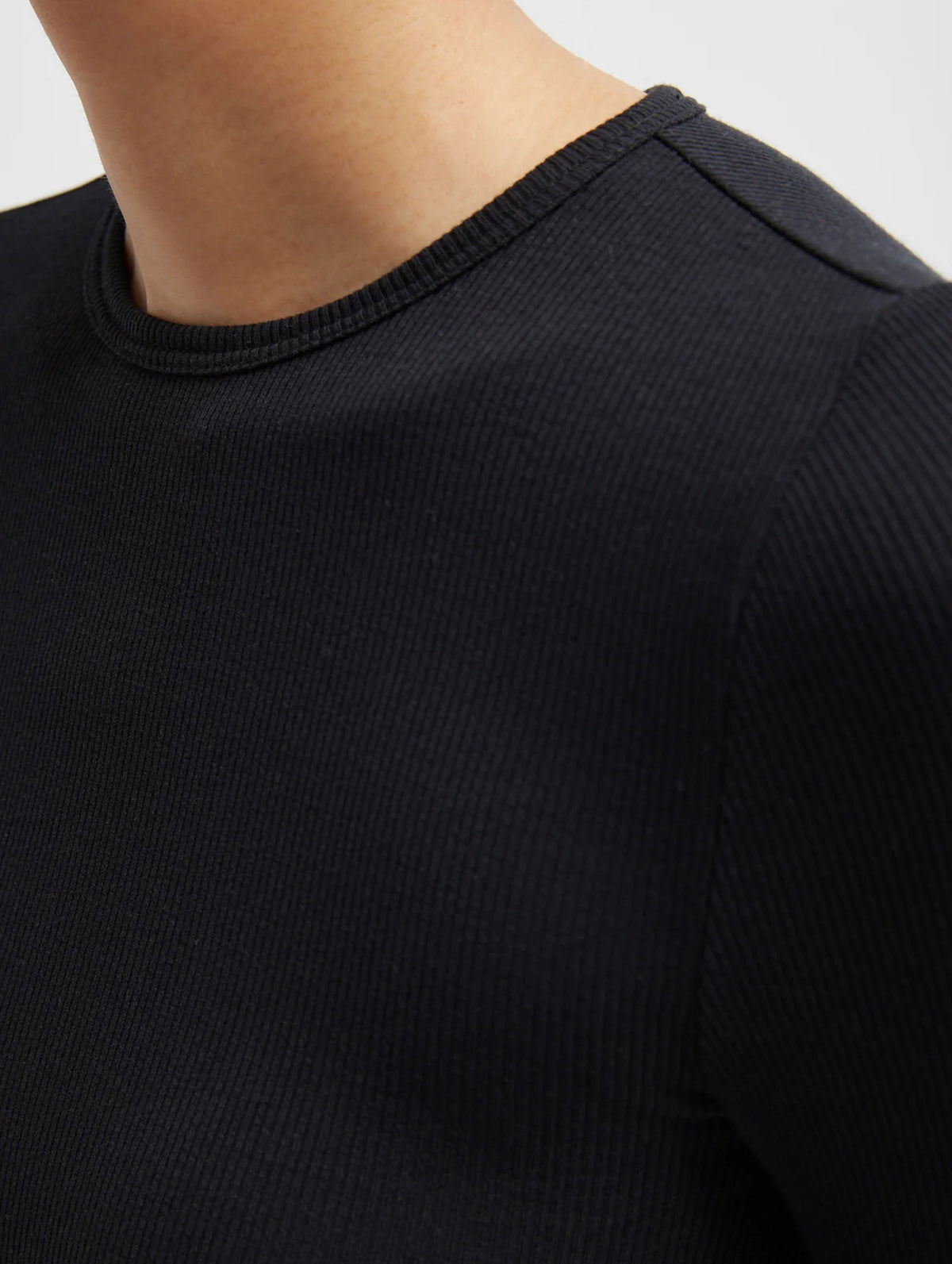 Circular Ribbed Crewneck Pullover in Black